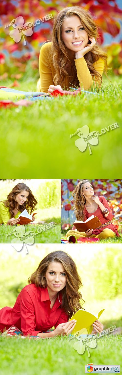 Woman with book in the park 0398